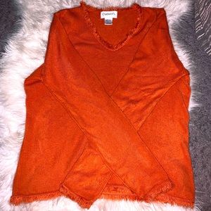 Chadwick’s orange sweater